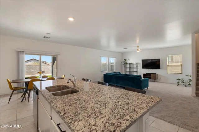 a bedroom with a bed and cabinets