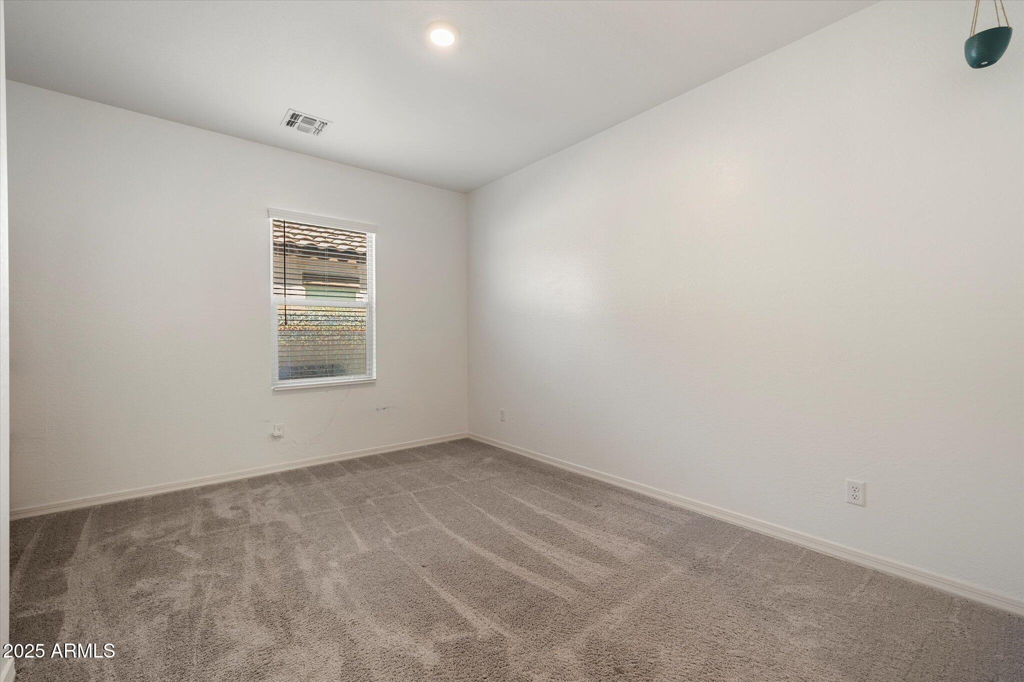6350 West Latona Road Laveen, AZ 85339 - Photo 23 of 42 a view of room and window