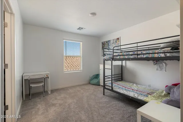 a view of room with furniture and a window