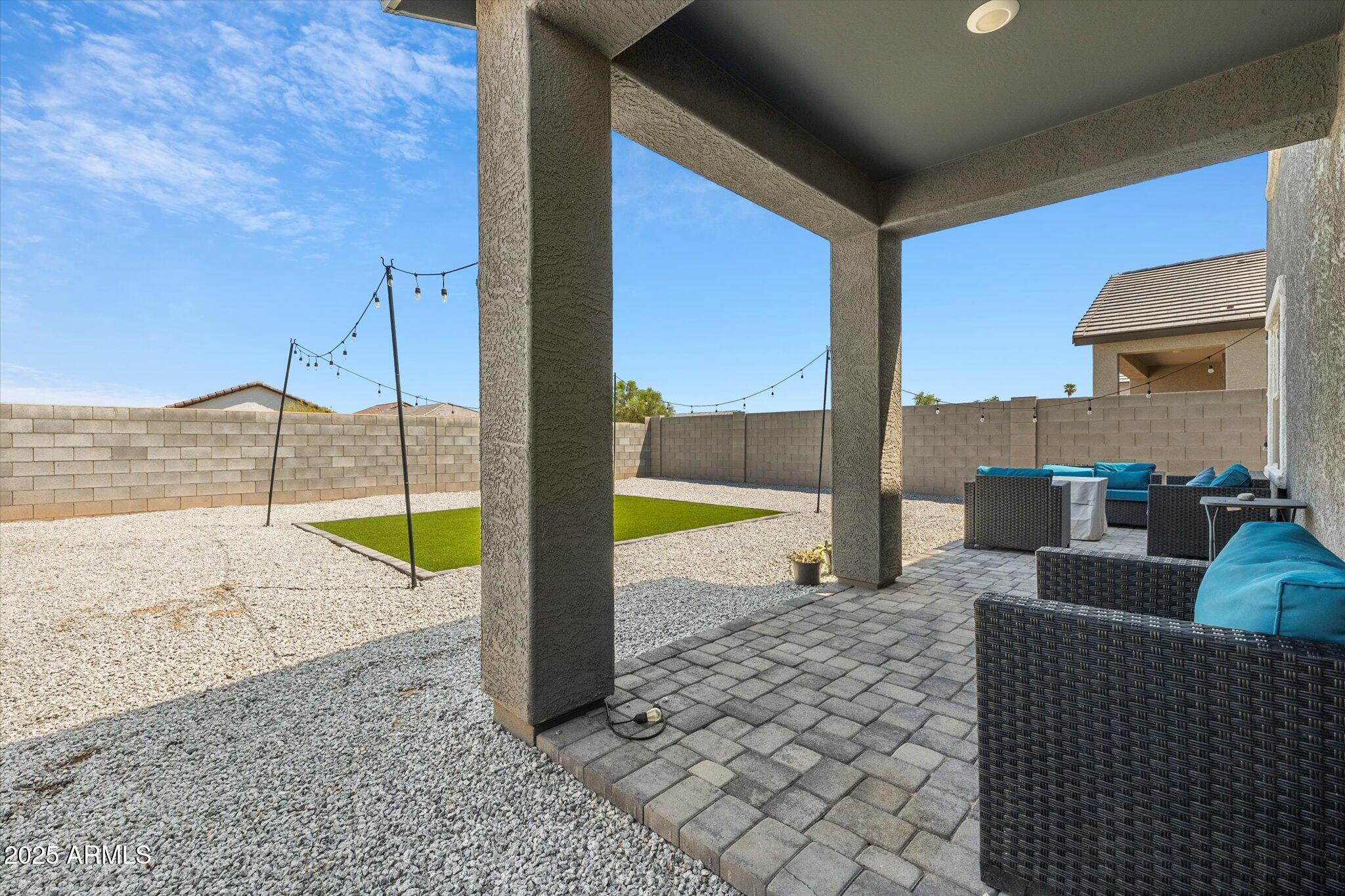 6350 West Latona Road Laveen, AZ 85339 - Photo 34 of 42 a swimming pool with outdoor seating