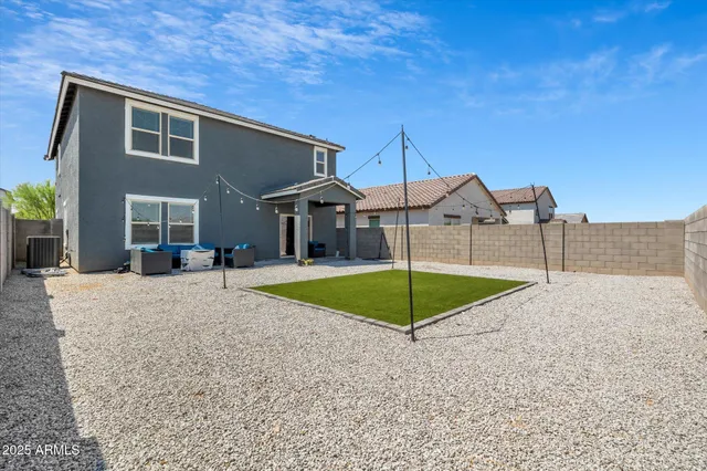 an aerial view of residential building with outdoor space and ocean view