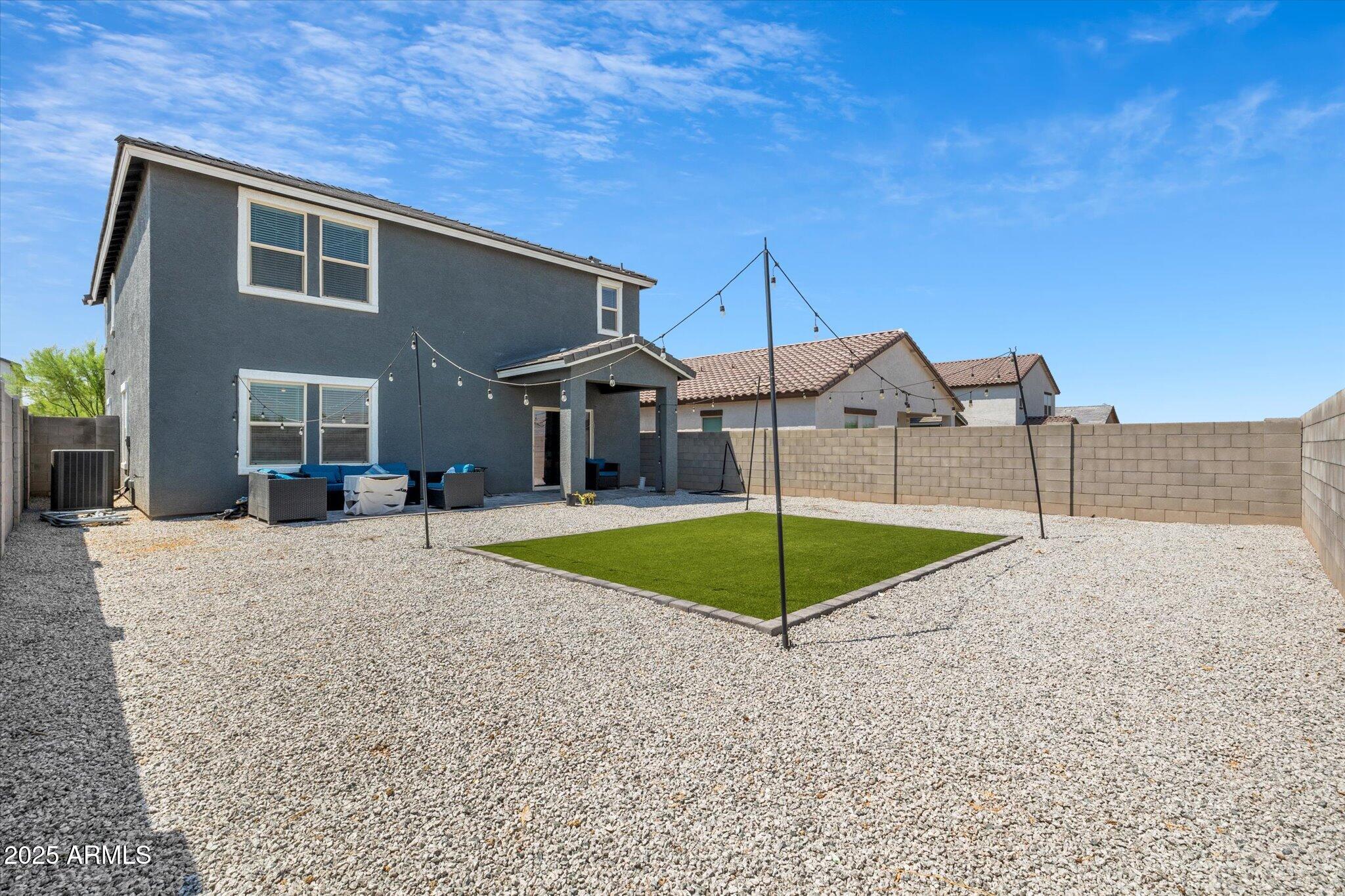 6350 West Latona Road Laveen, AZ 85339 - Photo 35 of 42 a house with swimming pool in front of it