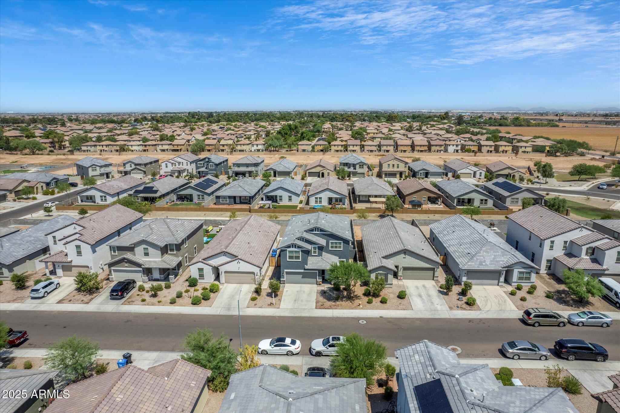 6350 West Latona Road Laveen, AZ 85339 - Photo 39 of 42 an aerial view of a building and city