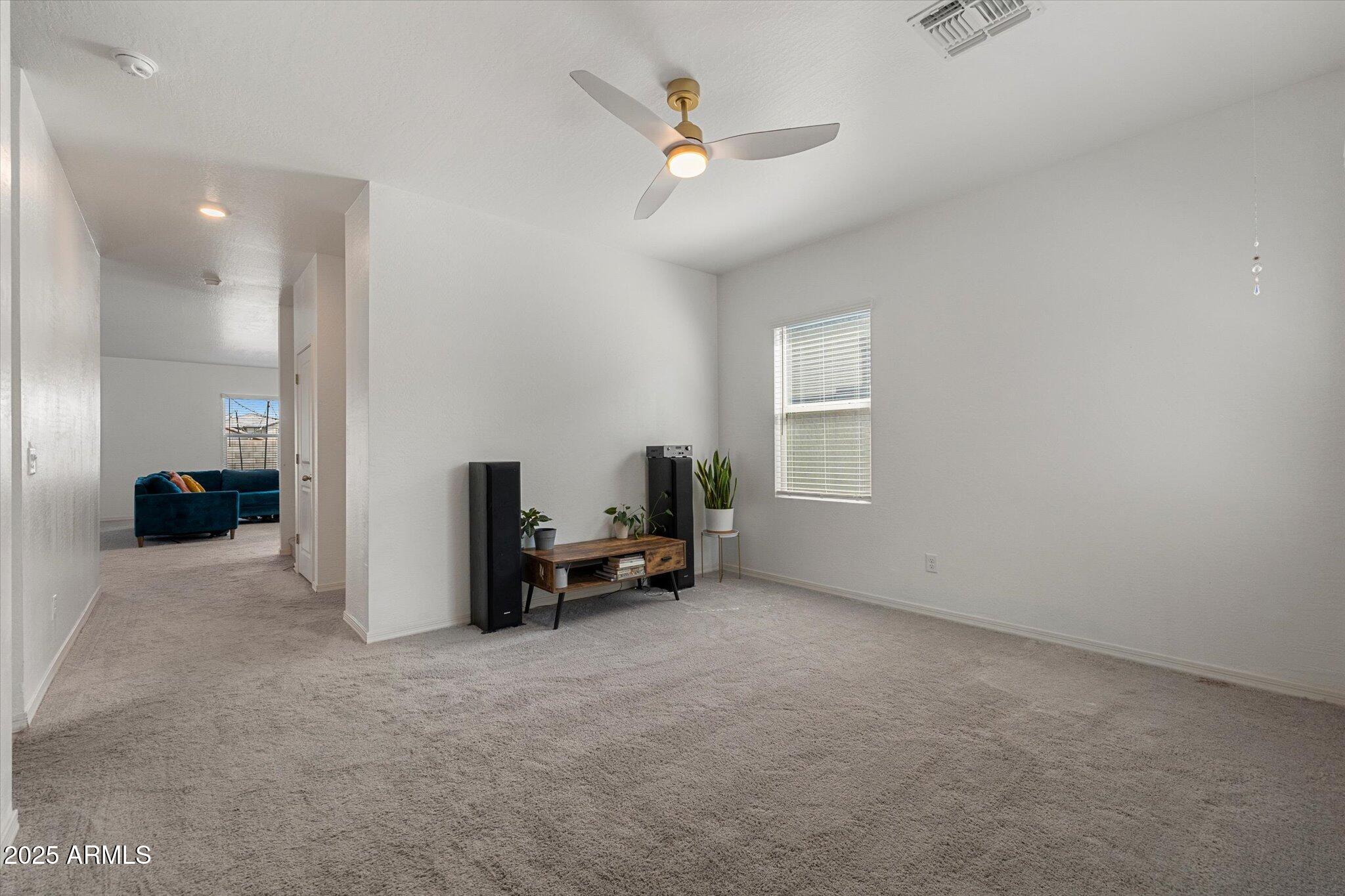 6350 West Latona Road Laveen, AZ 85339 - Photo 7 of 42 a view of livingroom with furniture