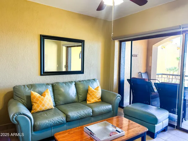 a living room with furniture and a window