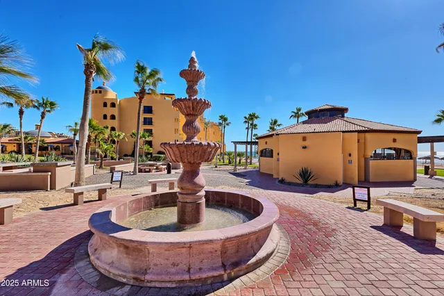 a view of swimming pool with a yard