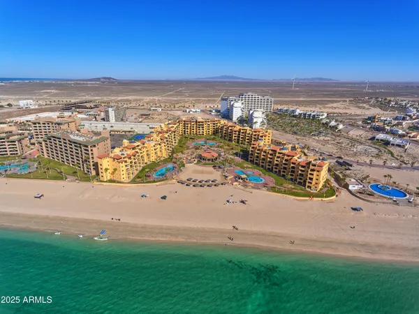 a view of a swimming pool with a sitting space