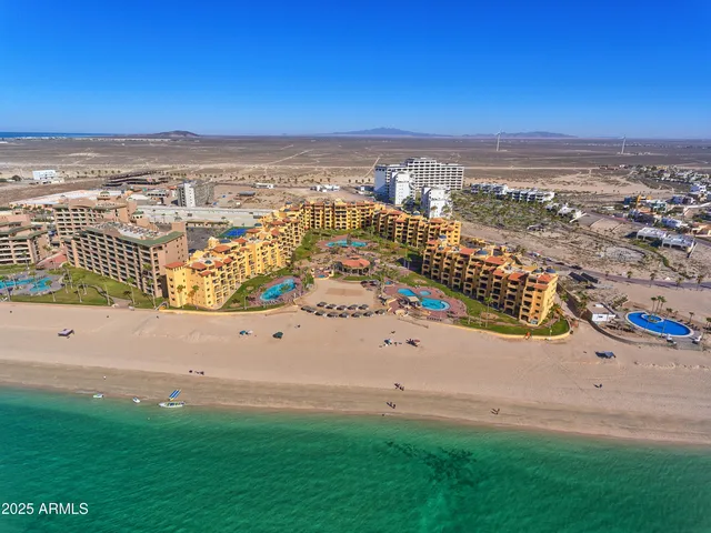 a view of a swimming pool with a sitting space