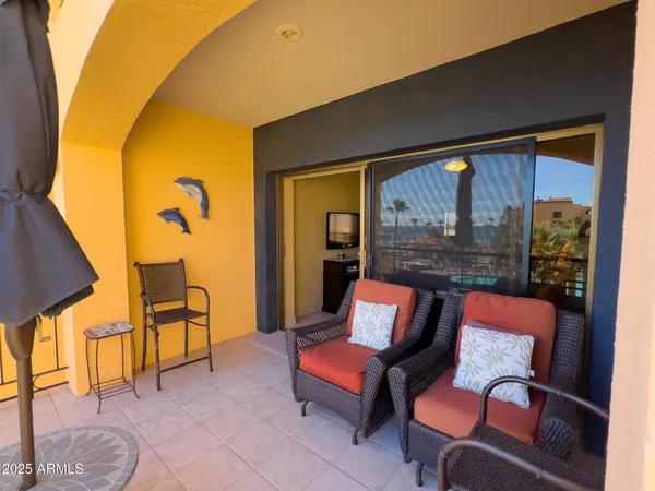 a outdoor living space with patio furniture