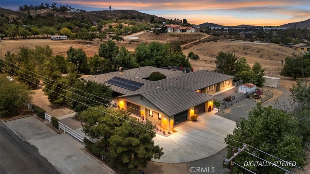 16420 Rocky Glen Road Perris, CA 92570 - Photo 7 of 74 an aerial view of a house having yard
