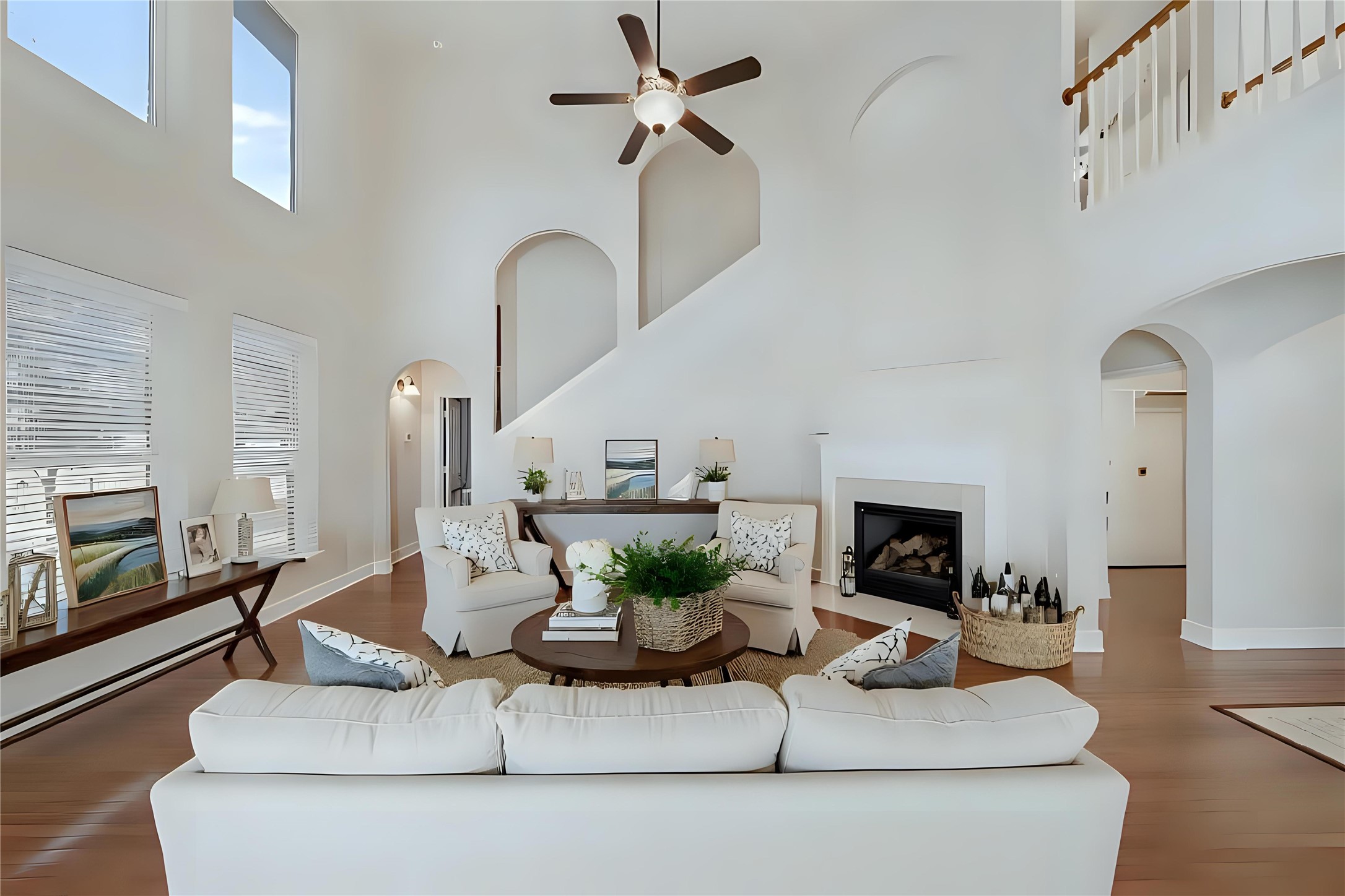 6015 Biltmore Court Rosenberg, TX 77471 - Photo 3 of 31 a living room with furniture a fireplace and a flat screen tv