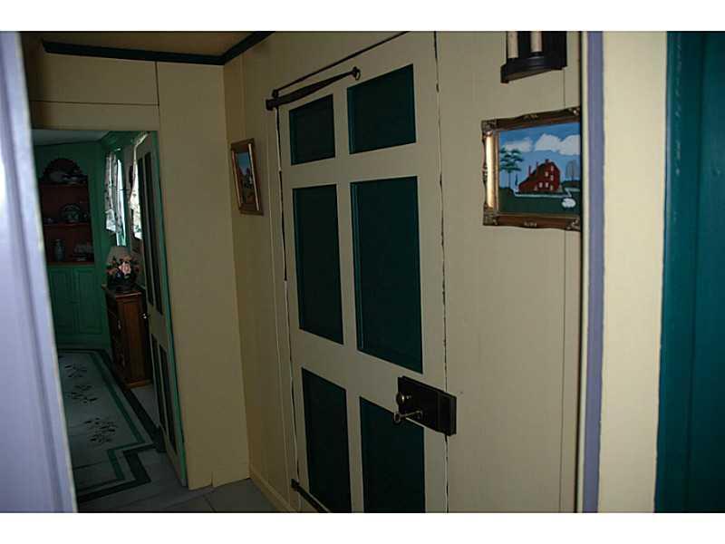 144 Ferry Road Saco, ME 04072 - Photo 8 of 34 Hallway. Large paneled front door...