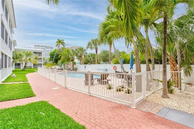 a view of a balcony with a tree