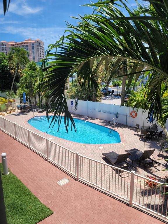 1439 South Ocean Boulevard, Unit 211 Pompano Beach, FL 33062 - Photo 18 of 46 a view of outdoor space and yard