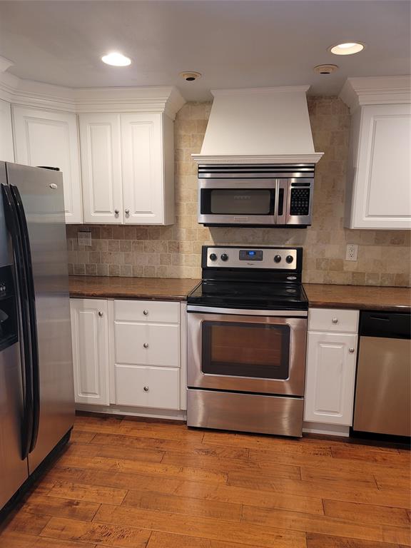 1439 South Ocean Boulevard, Unit 211 Pompano Beach, FL 33062 - Photo 19 of 46 a kitchen with granite countertop a refrigerator stove and sink