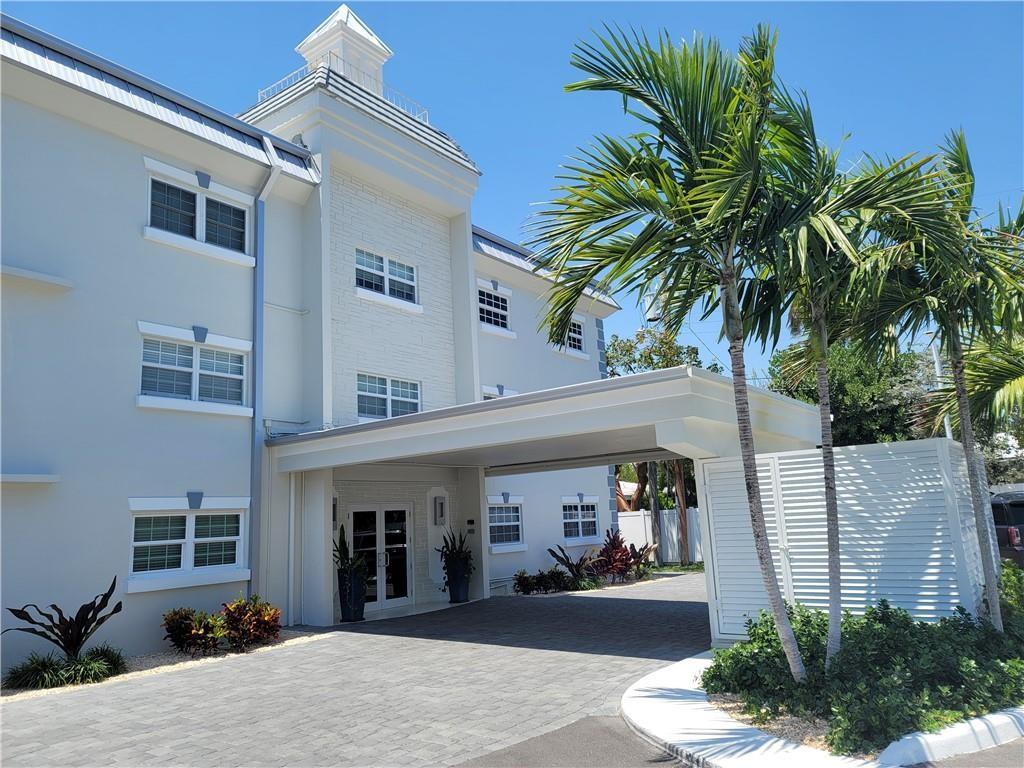 1439 South Ocean Boulevard, Unit 211 Pompano Beach, FL 33062 - Photo 6 of 46 a view of a house with a patio