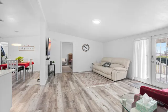 a living room with furniture and a couch