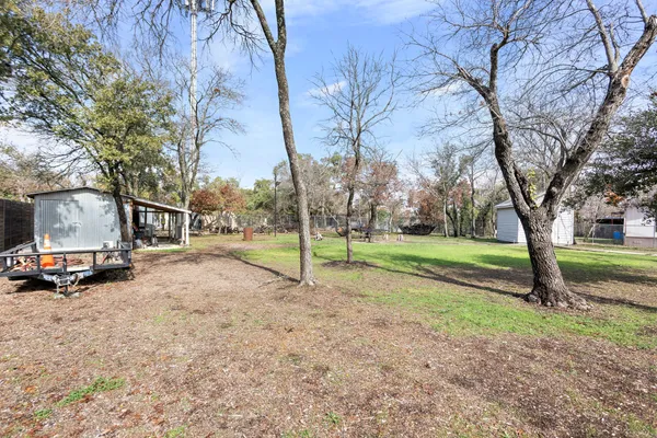 a view of a house with a back yard