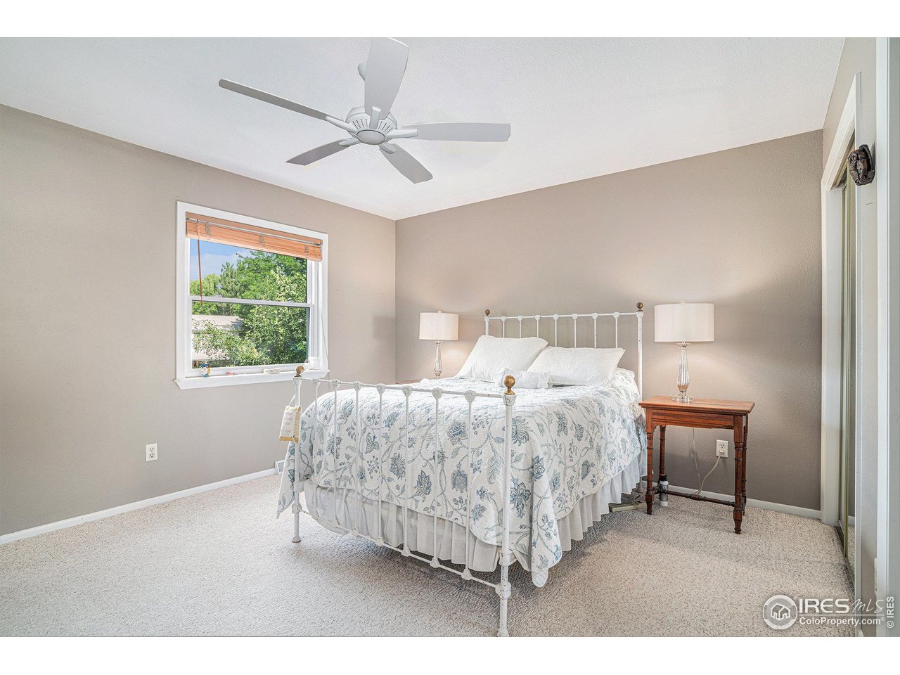 1918 Ridgewood Road Fort Collins, CO 80526 - Photo 15 of 30 Generous primary bedroom with plenty of room to unwind and recharge