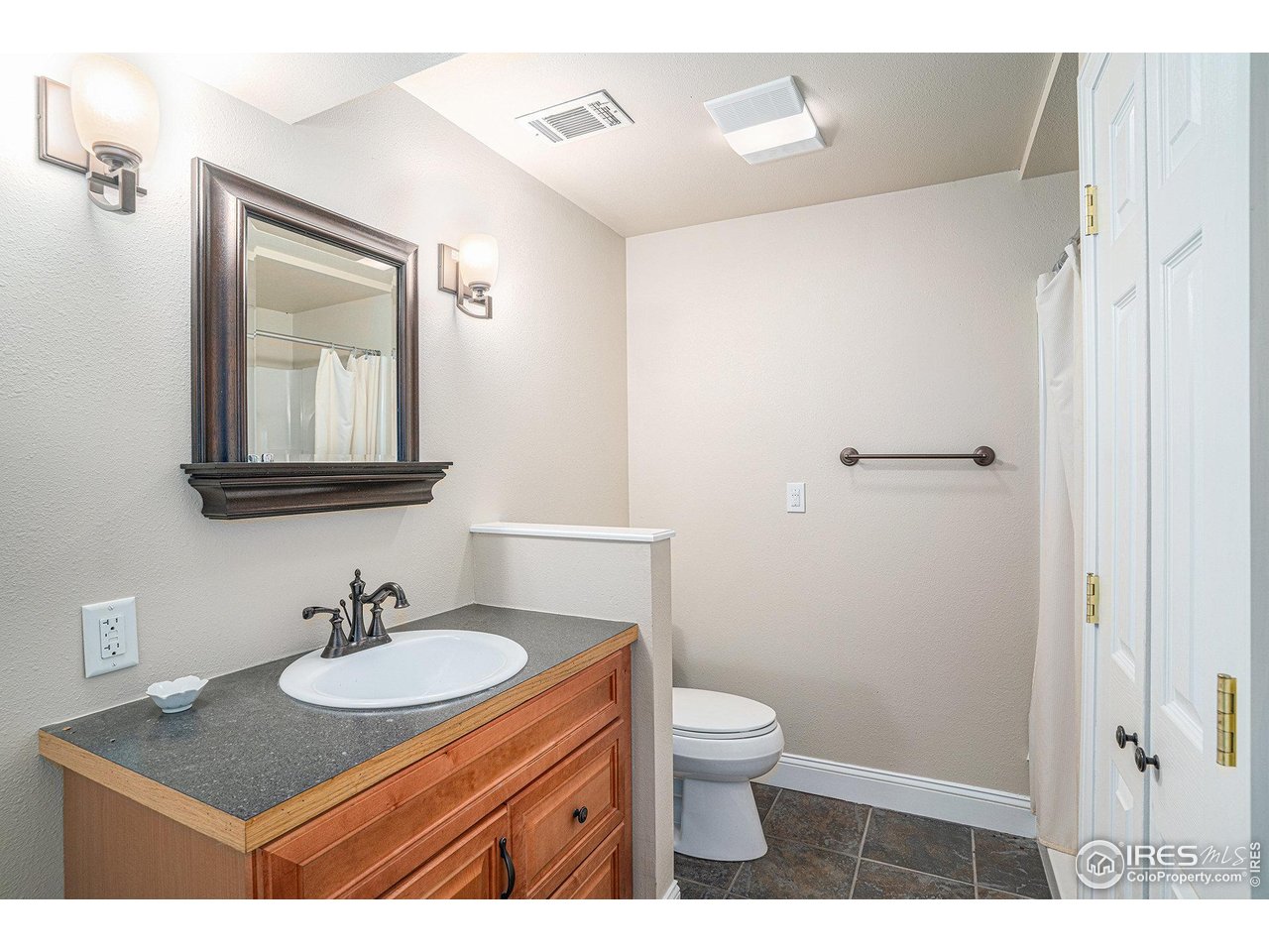 1918 Ridgewood Road Fort Collins, CO 80526 - Photo 21 of 30 Full bathroom in the basement with stand-in shower provides the perfect private retreat
