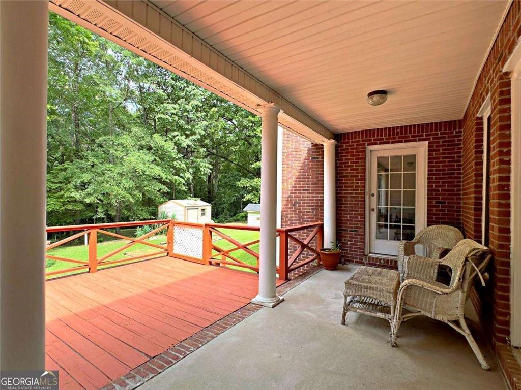 240 Riverview Road Jackson, GA 30233 - Photo 55 of 79 a building outdoor space with seating area