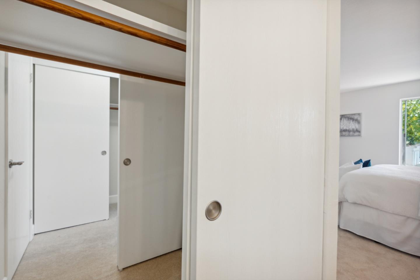 101 Redding Road, Unit B2 Campbell, CA 95008 - Photo 23 of 32 a living room with furniture and a gate