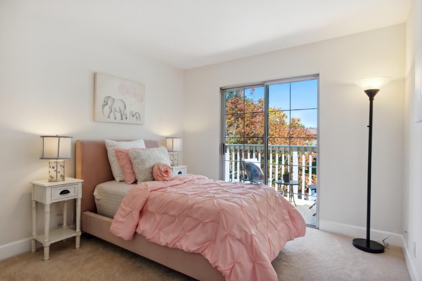 101 Redding Road, Unit B2 Campbell, CA 95008 - Photo 27 of 32 a bedroom with a bed and a night stand