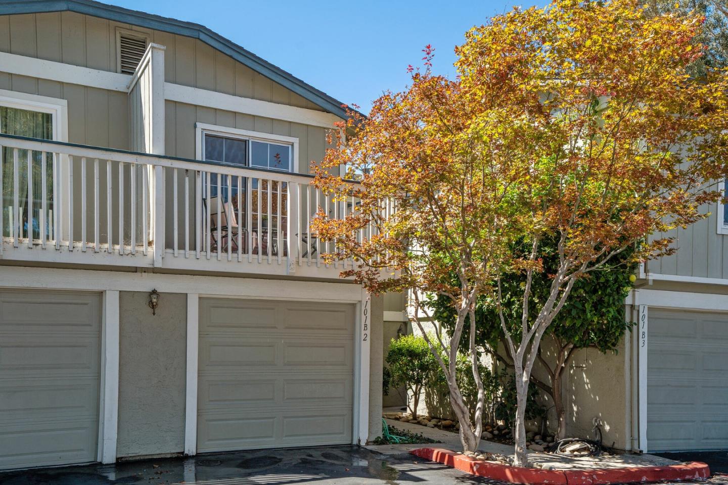 101 Redding Road, Unit B2 Campbell, CA 95008 - Photo 5 of 32 a view of a house with a tree