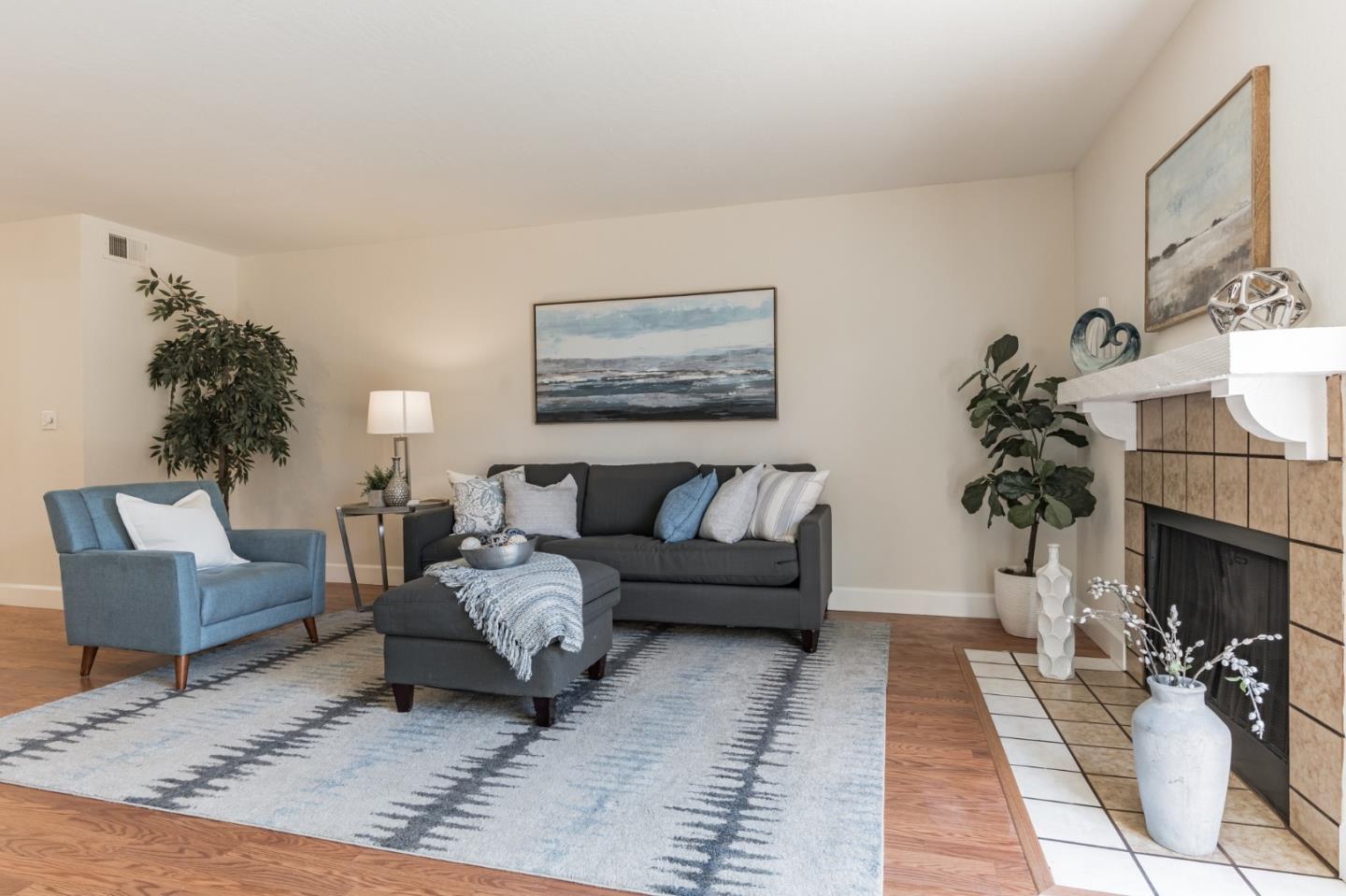 101 Redding Road, Unit B2 Campbell, CA 95008 - Photo 7 of 32 a living room with furniture and a fireplace