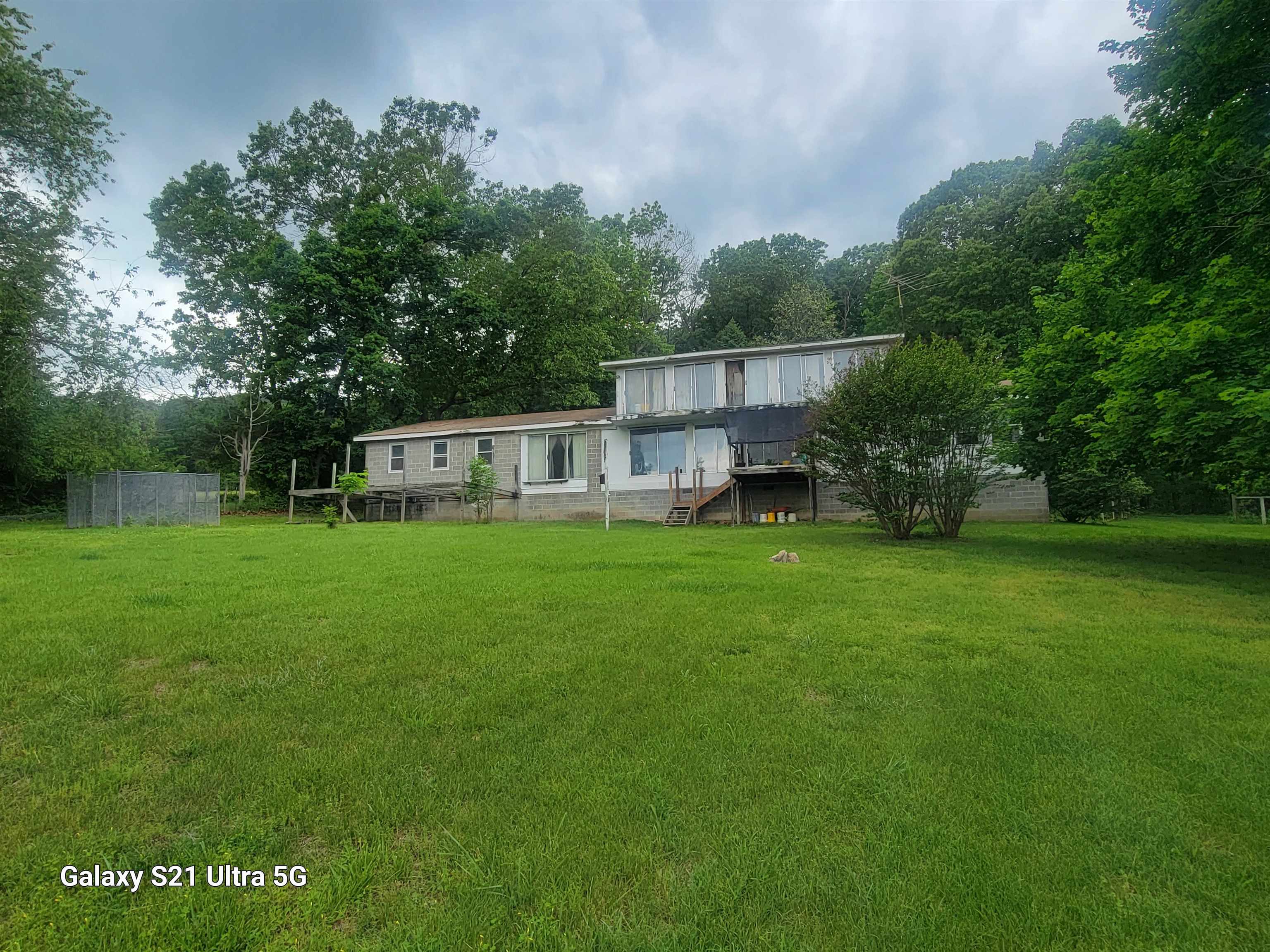 1189 Shipwreck Road Shenandoah, VA 22849 - Photo 5 of 22 a view of a house with a backyard