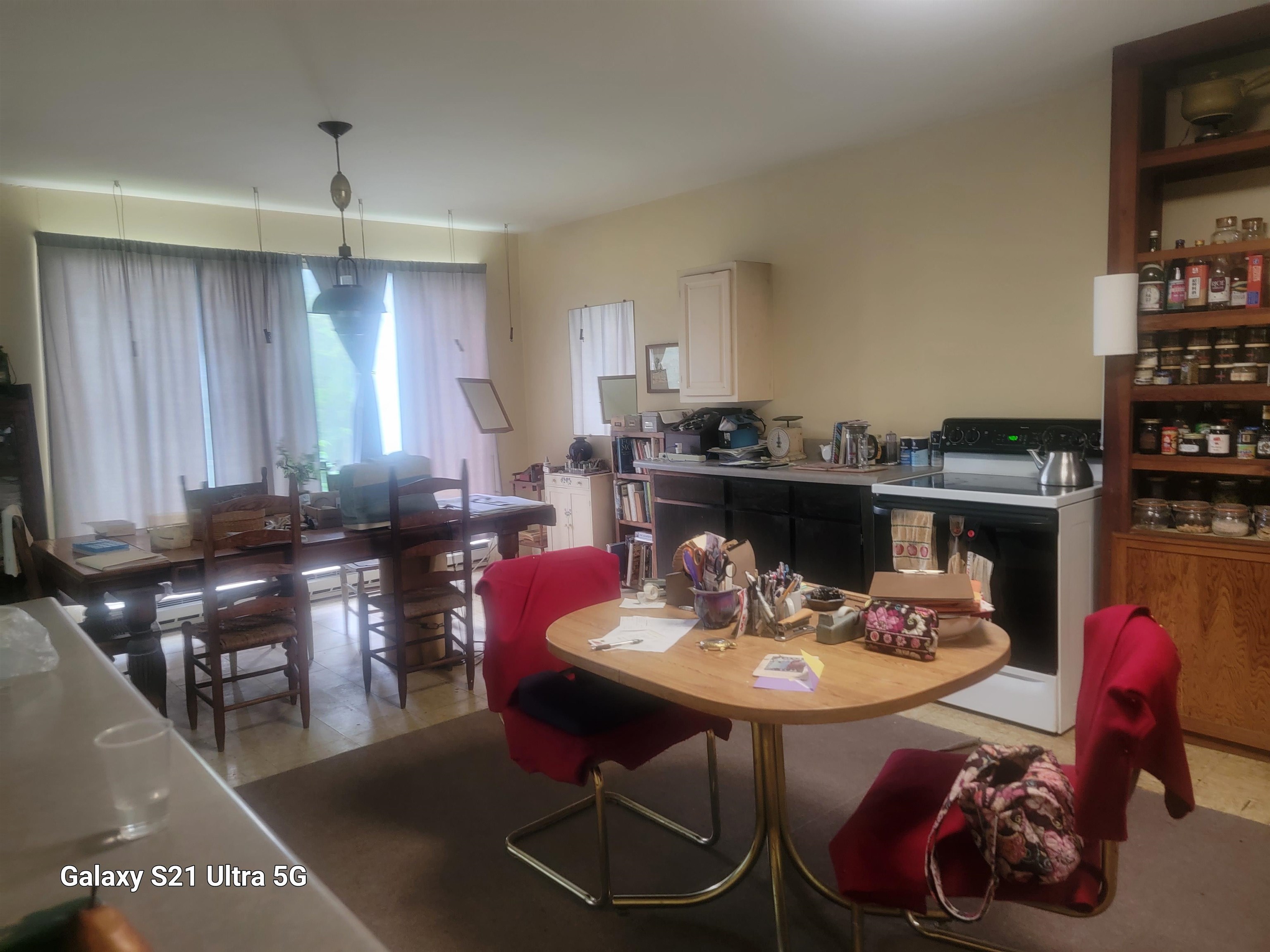1189 Shipwreck Road Shenandoah, VA 22849 - Photo 8 of 22 a dining room with furniture a rug and a chandelier