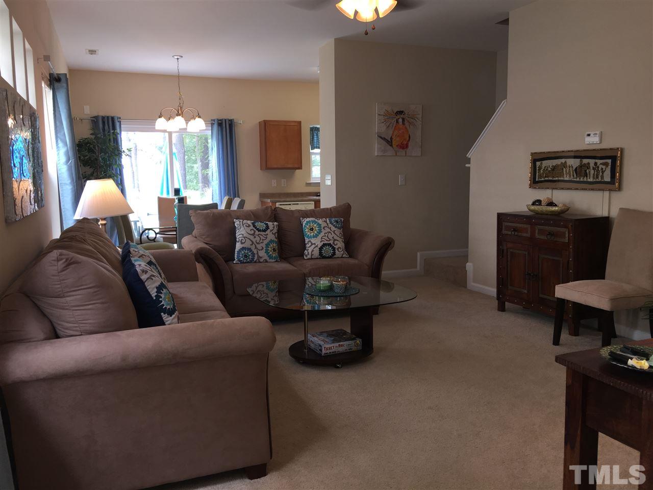 2136 Persimmon Ridge Drive Raleigh, NC 27604 - Photo 5 of 23 a living room with furniture and a flat screen tv