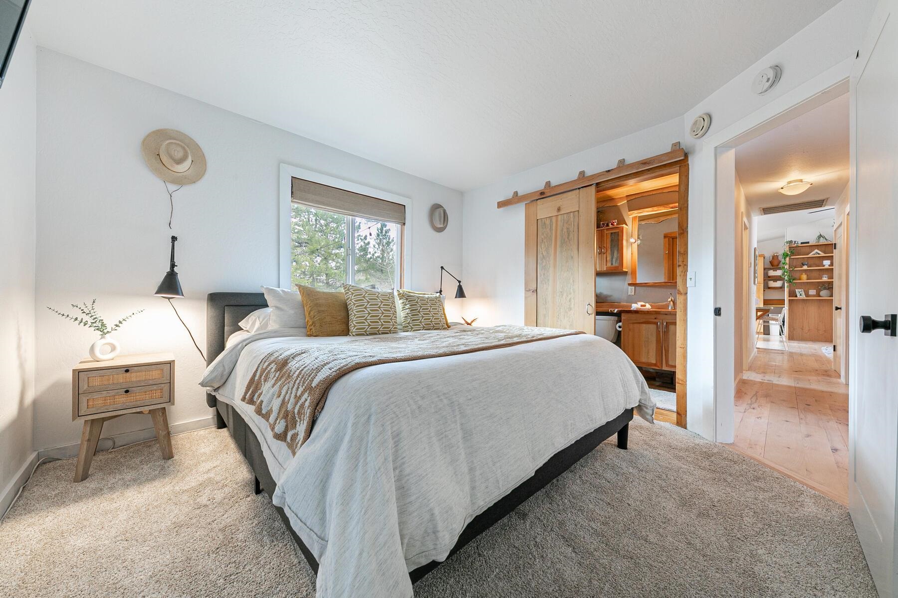 11151 Dorchester Drive Truckee, CA 96161 - Photo 14 of 27 a bedroom with a bed and a cabinets