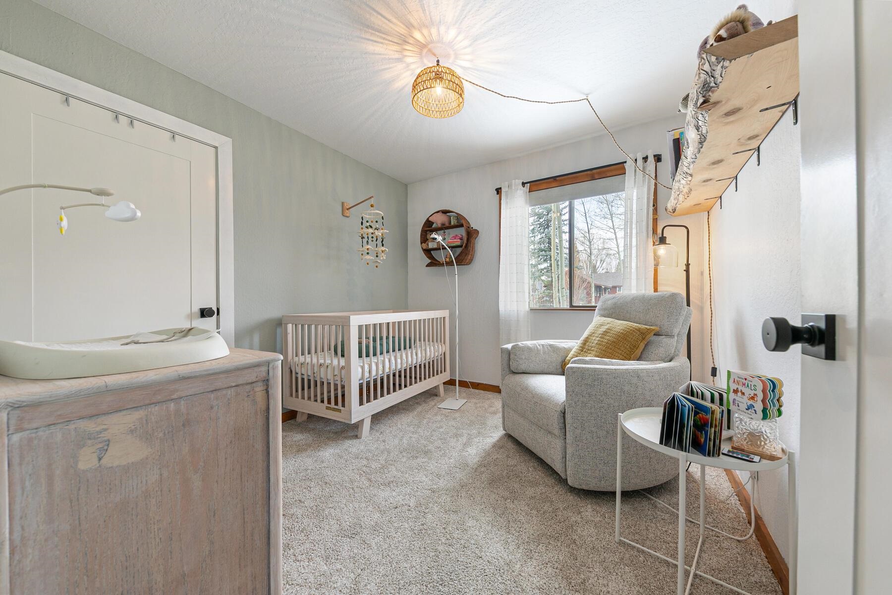 11151 Dorchester Drive Truckee, CA 96161 - Photo 19 of 27 a living room with furniture and a window