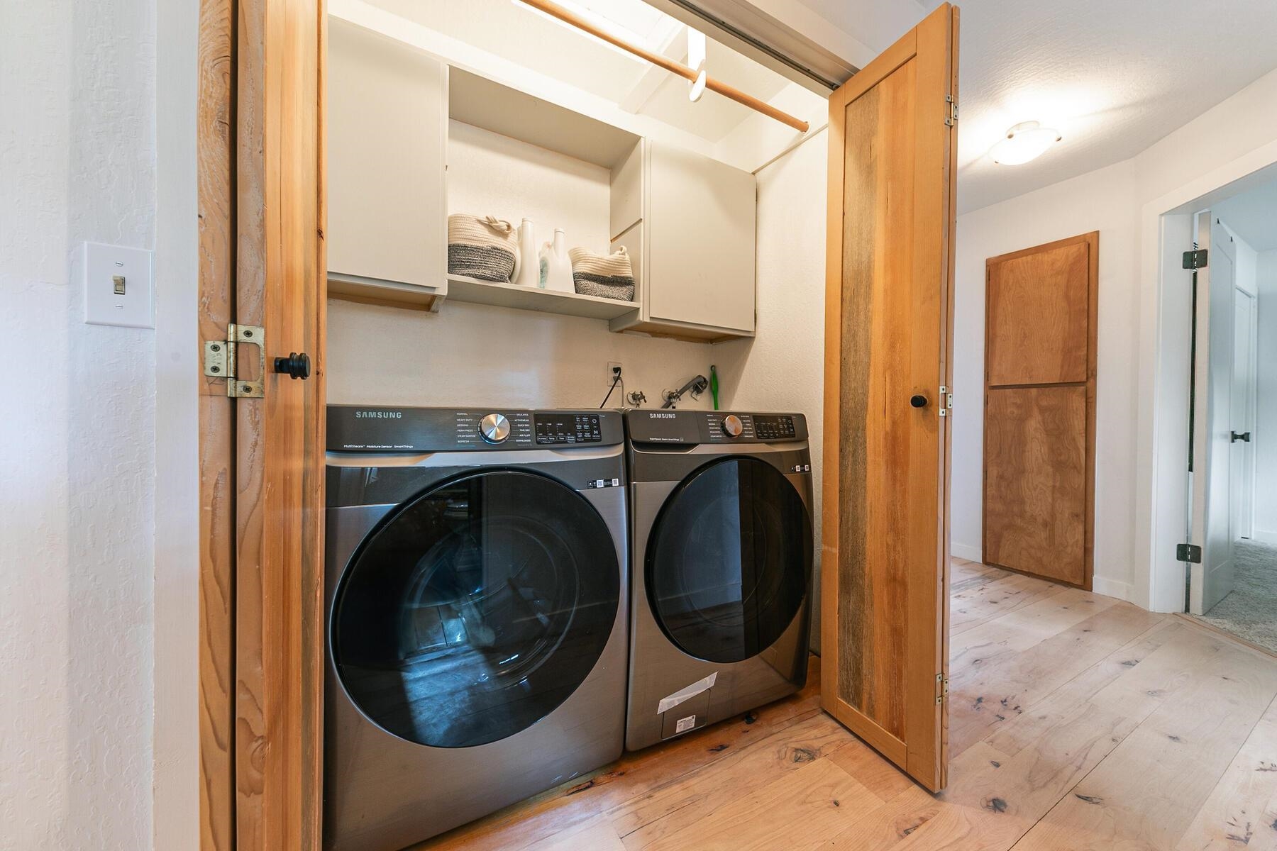 11151 Dorchester Drive Truckee, CA 96161 - Photo 21 of 27 a view of a hallway with washer and dryer