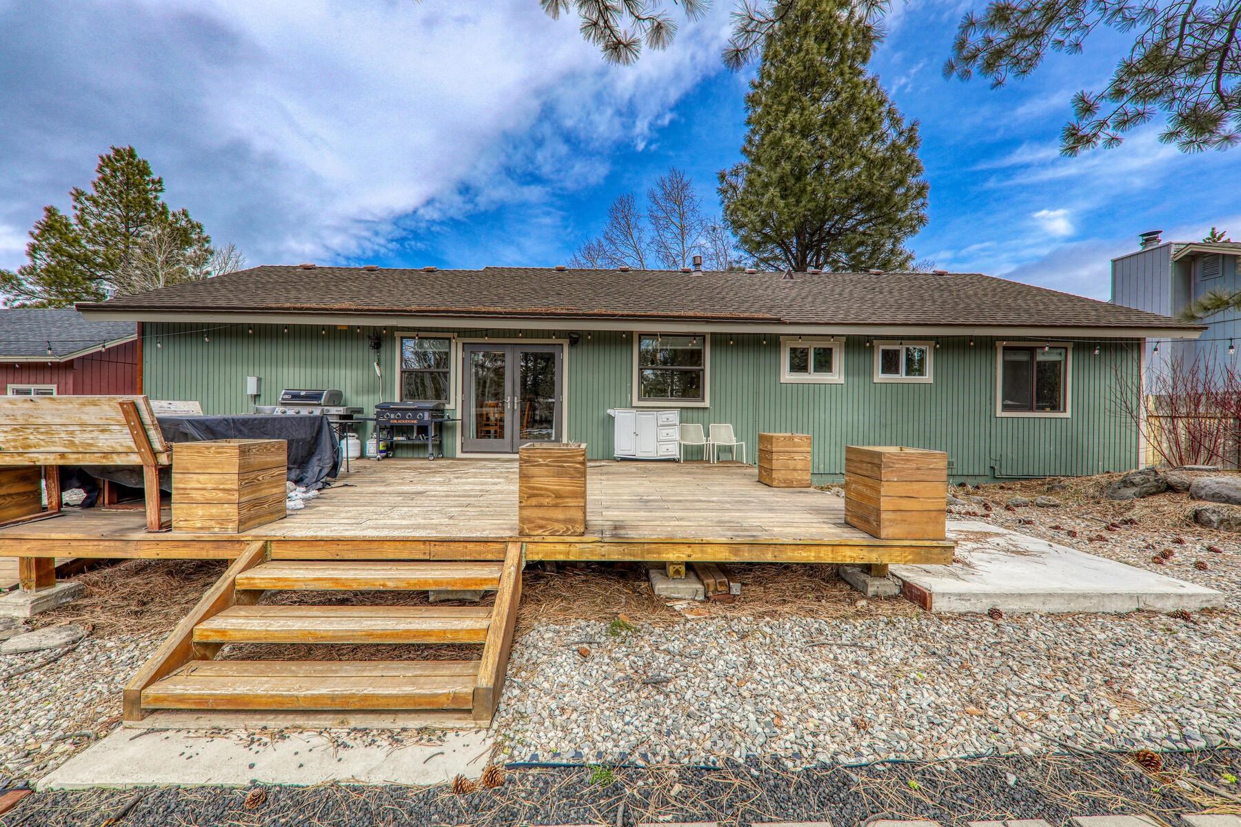 11151 Dorchester Drive Truckee, CA 96161 - Photo 26 of 27 a view of a house with backyard and sitting area
