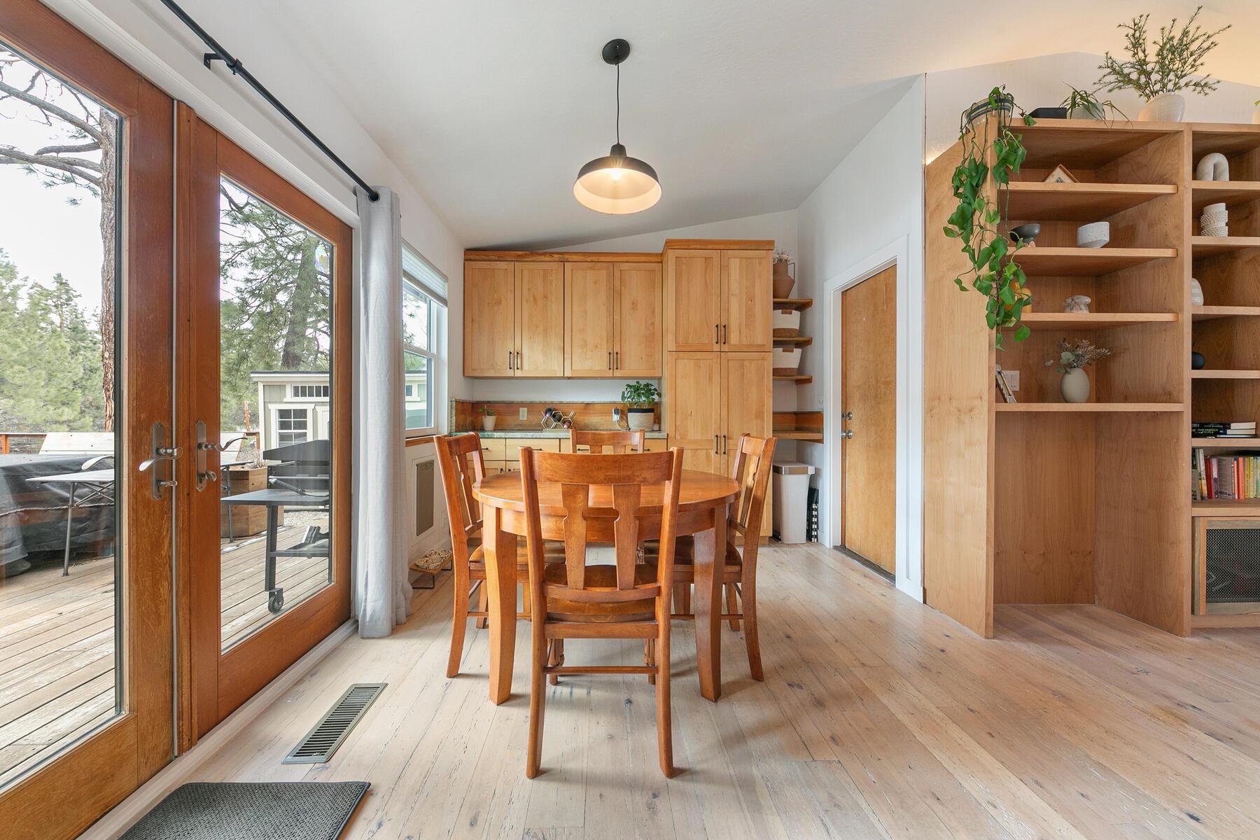 11151 Dorchester Drive Truckee, CA 96161 - Photo 9 of 27 a view of a dining room with furniture window and wooden floor