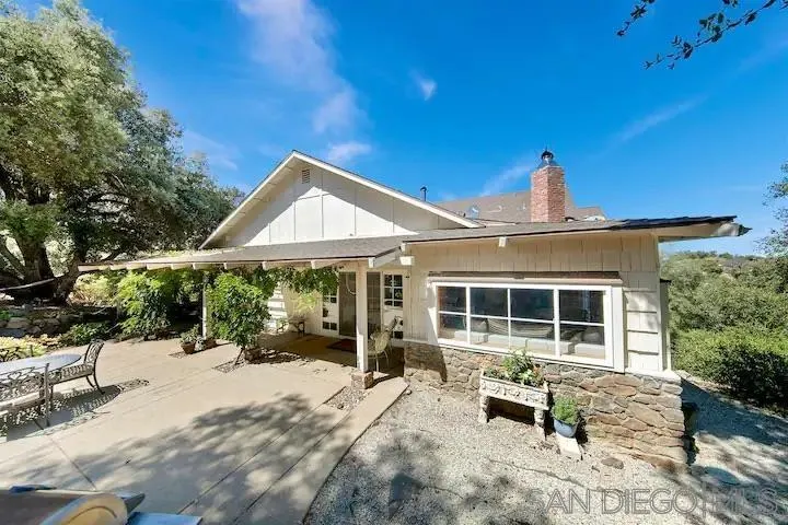 3505 Deer Lake Park Road Julian, CA 92036 - Photo 17 of 46 a view of a house with backyard sitting area and garden