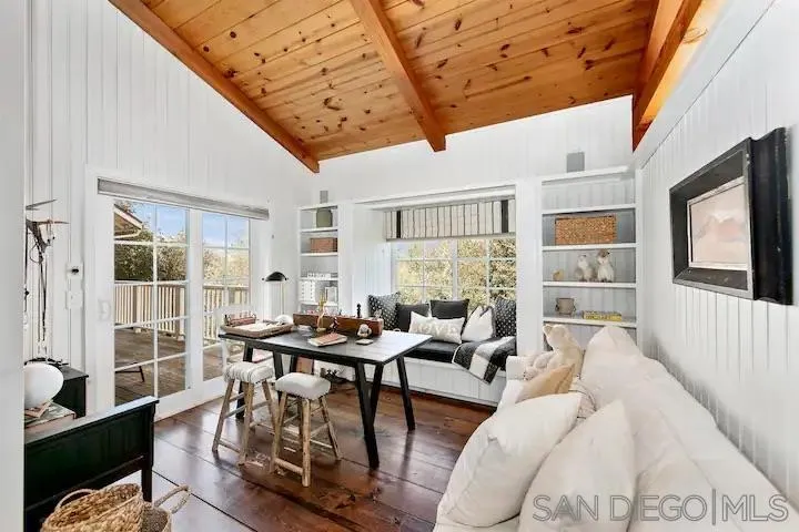 3505 Deer Lake Park Road Julian, CA 92036 - Photo 2 of 46 a living room with furniture and a floor to ceiling window