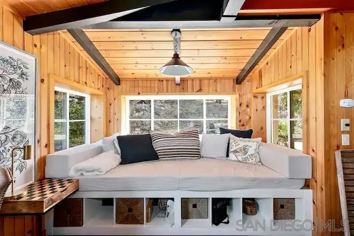 3505 Deer Lake Park Road Julian, CA 92036 - Photo 22 of 46 a bedroom with furniture and windows