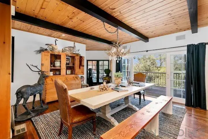 3505 Deer Lake Park Road Julian, CA 92036 - Photo 24 of 46 a outdoor dining space with furniture and wooden floor