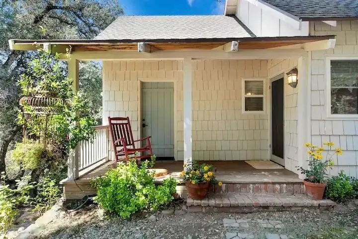 3505 Deer Lake Park Road Julian, CA 92036 - Photo 25 of 46 a front view of a house with a yard