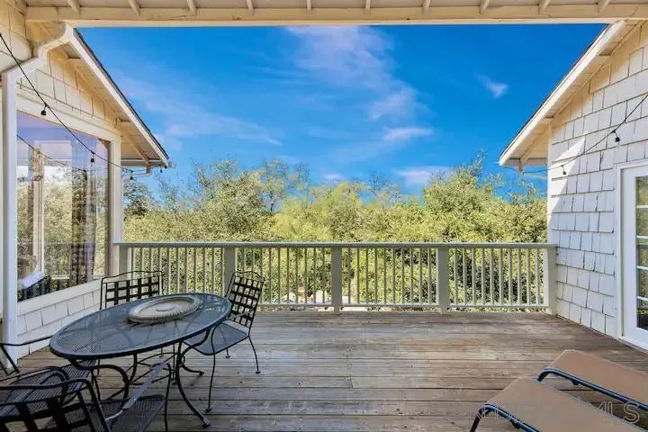 3505 Deer Lake Park Road Julian, CA 92036 - Photo 29 of 46 a view of a balcony with a table and chairs