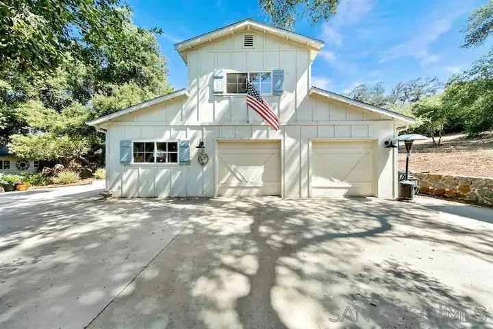 3505 Deer Lake Park Road Julian, CA 92036 - Photo 30 of 46 a front view of a house with a yard