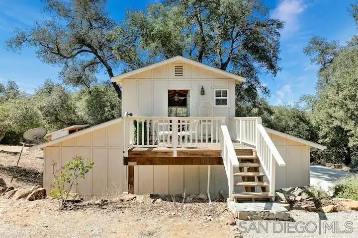 3505 Deer Lake Park Road Julian, CA 92036 - Photo 38 of 46 a front view of a house with a yard