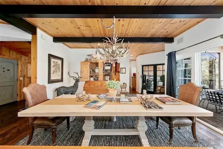 3505 Deer Lake Park Road Julian, CA 92036 - Photo 4 of 46 a view of a dining room with furniture window and wooden floor