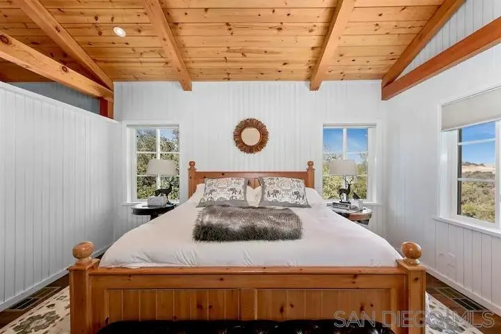 3505 Deer Lake Park Road Julian, CA 92036 - Photo 9 of 46 a bedroom with a bed and a window