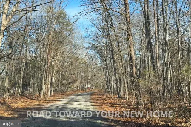 an aerial view of residential houses and city view
