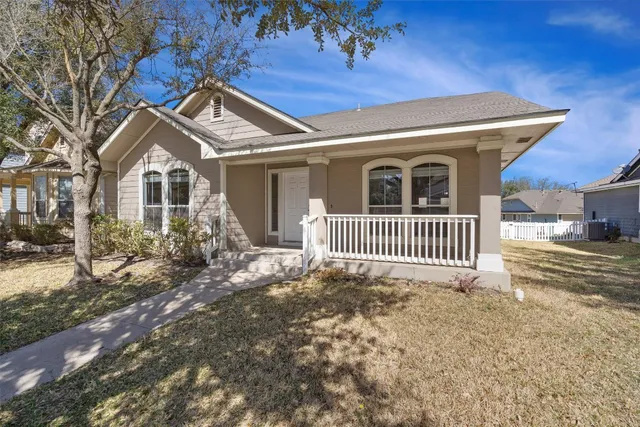 a front view of a house with a porch