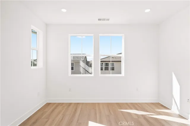 a bathroom with a sink a vanity and a mirror